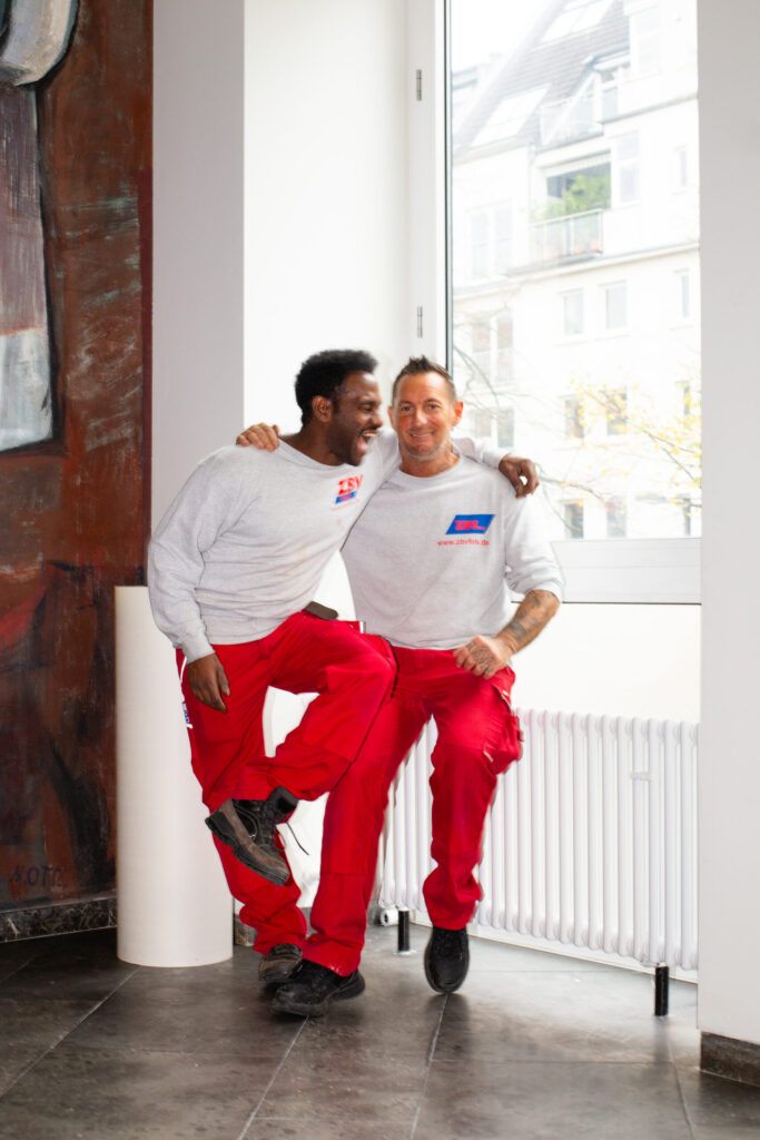 Two employees laughing